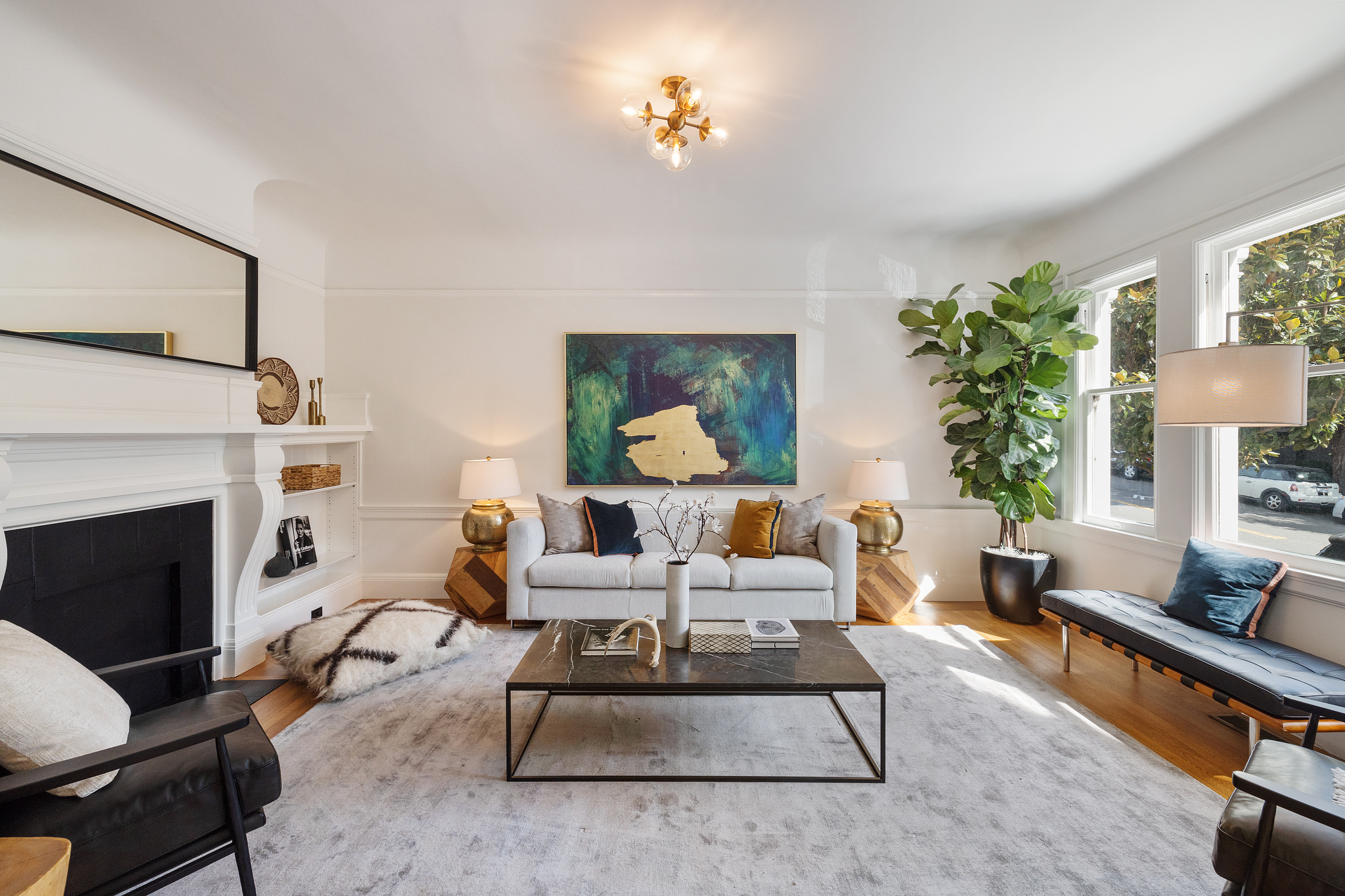 Living room, featuring wood floors and plenty of natural light