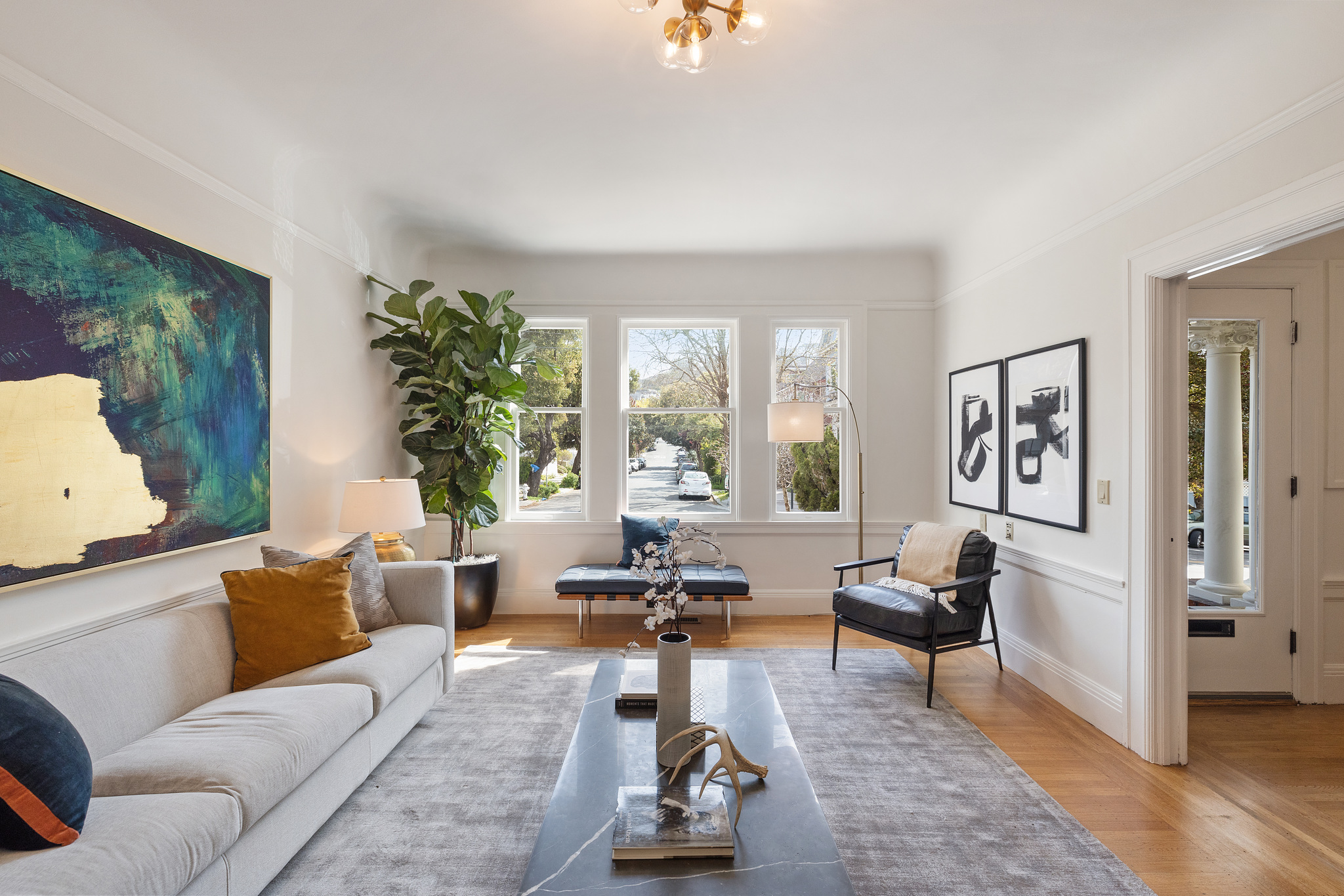 Living room with white wood trim
