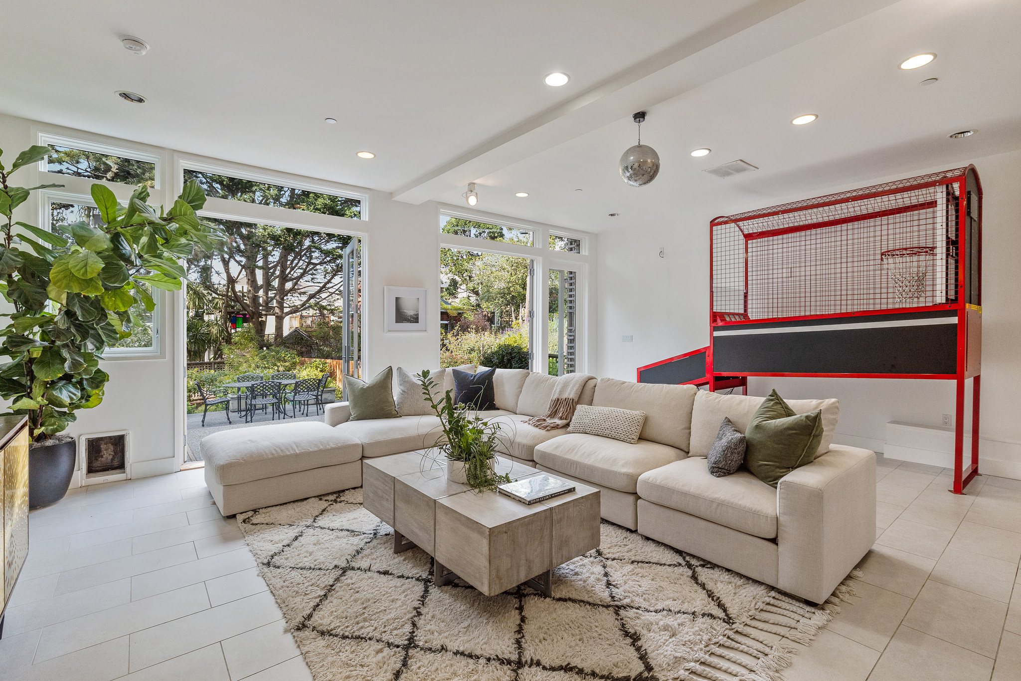 Lower living area, featuring two large glass exterior doors