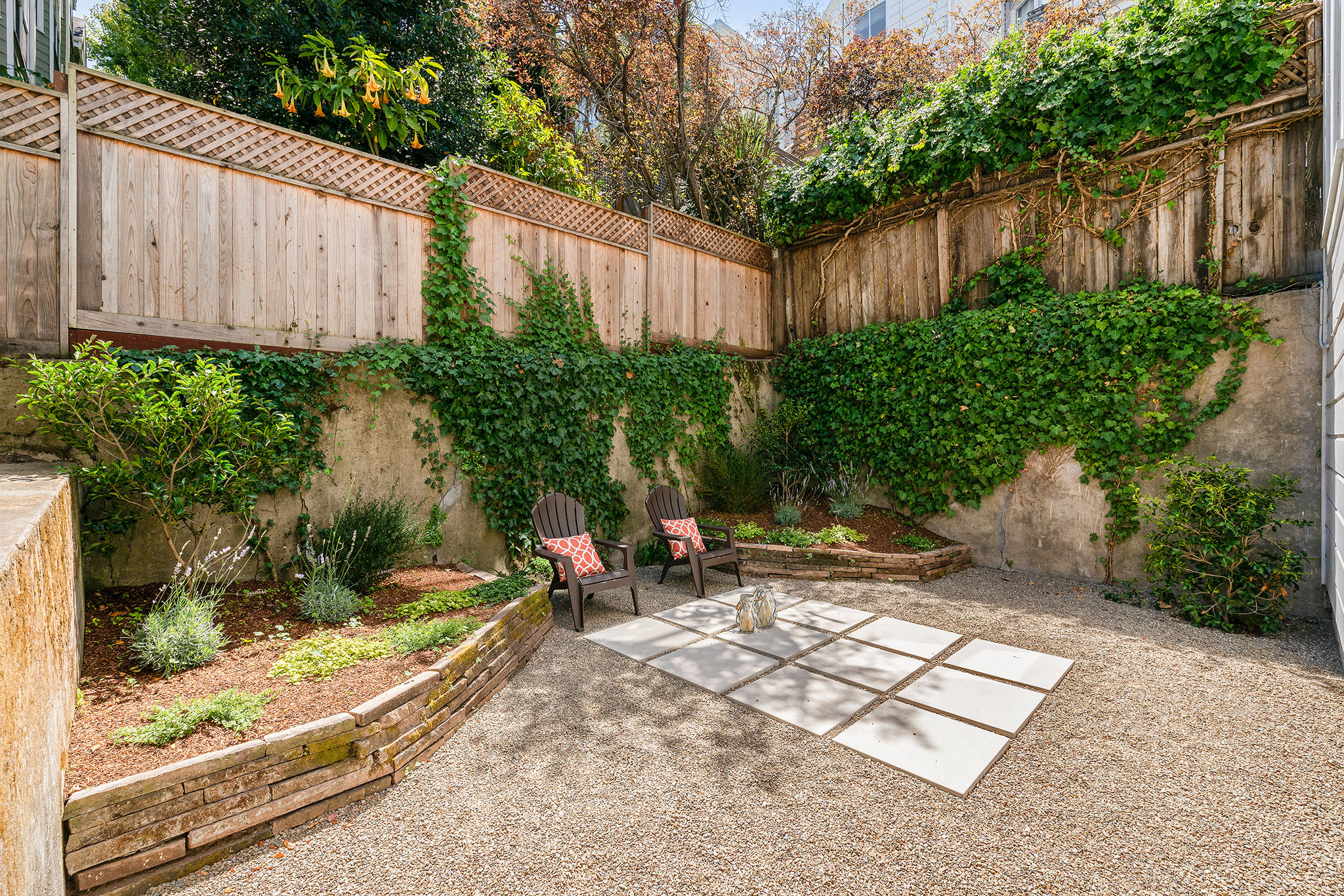 36 View of the out door space, featuring a large stone tiled patio area