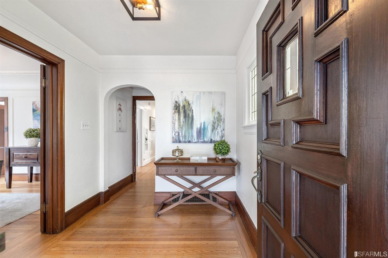 421601381160 Entryway of 78 Wawona Street, showing wood floors and an arched hallway