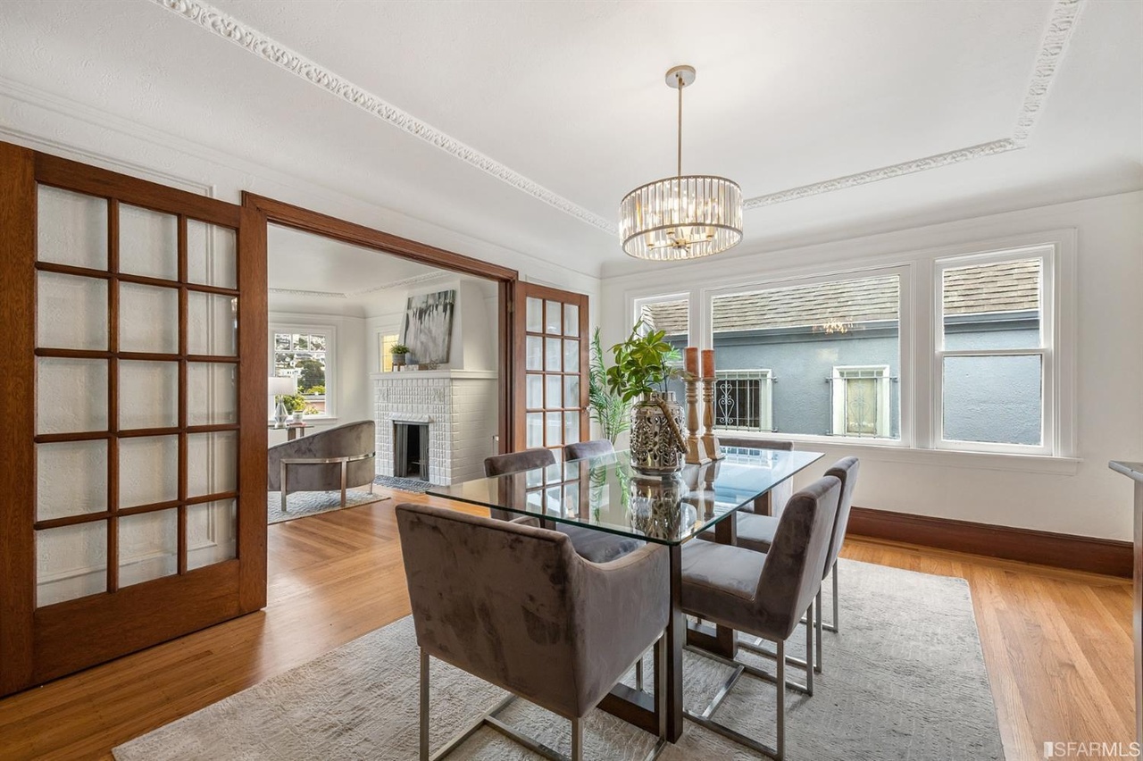 421601381260 Dining room at 78 Wawona Street, featuring large wooden French doors