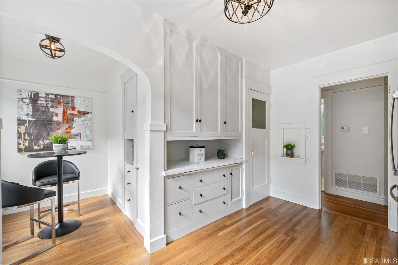 421601381350 Eat-in kitchen area and white built-in cabinets