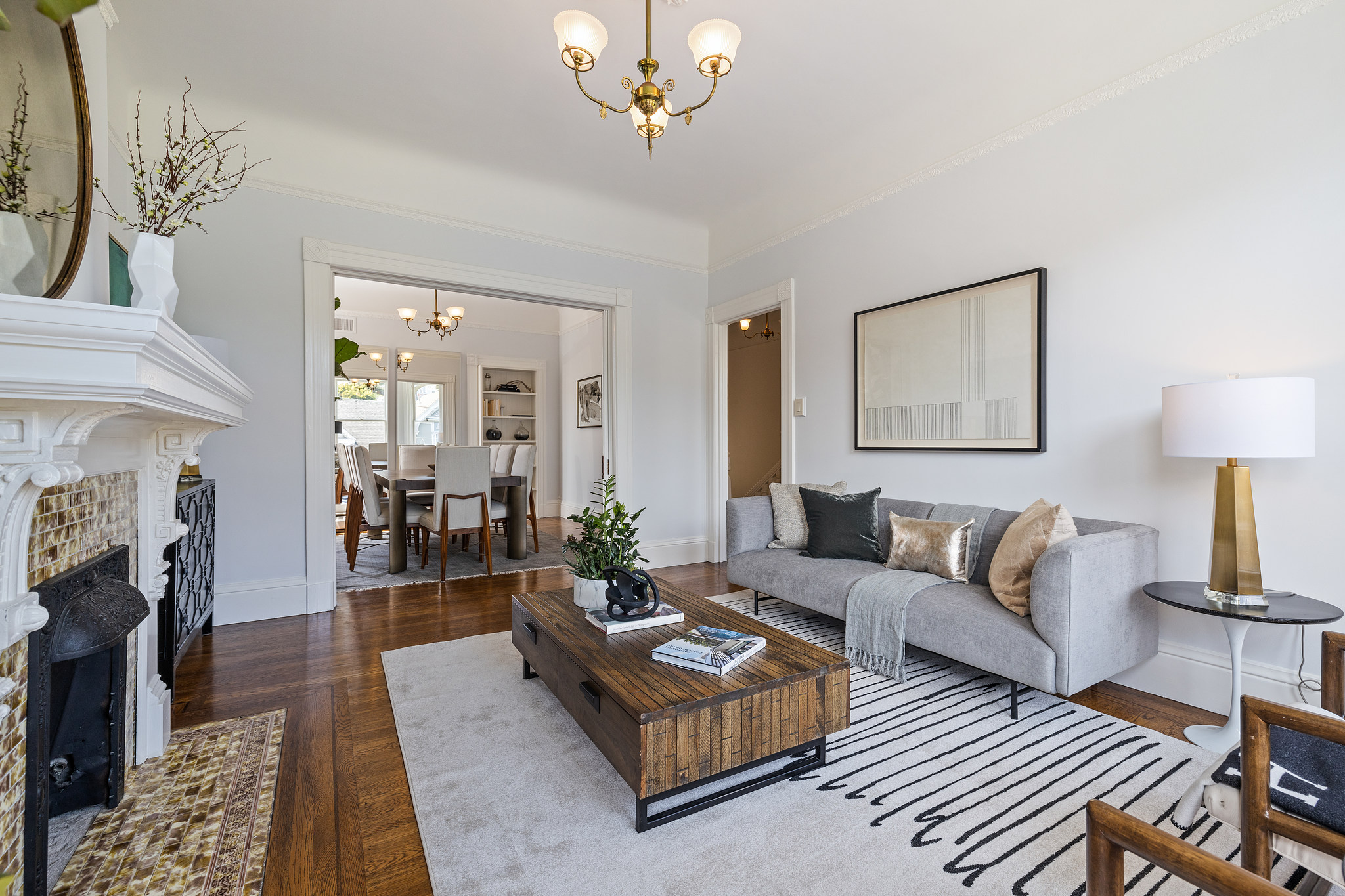 Living room at 454 Frederick Street, featuring wood floors and a fireplace