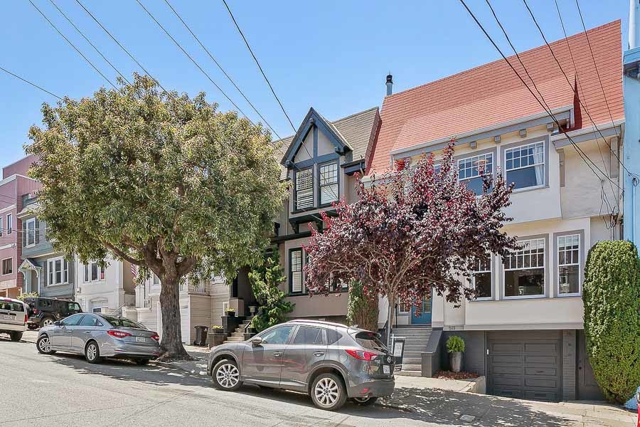 Exterior view of 511 15th Avenue, showing a home with tan facade
