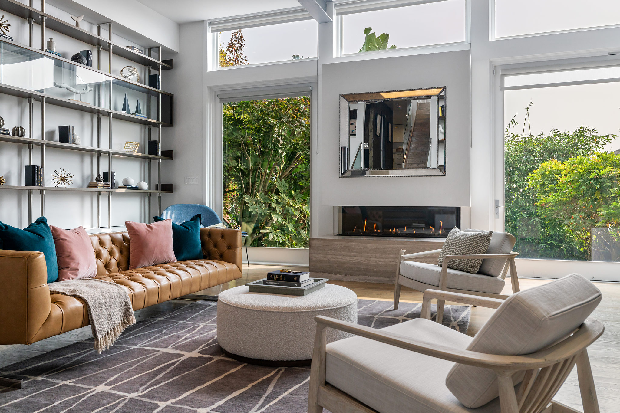 Living room with wood floors and built-in shelves