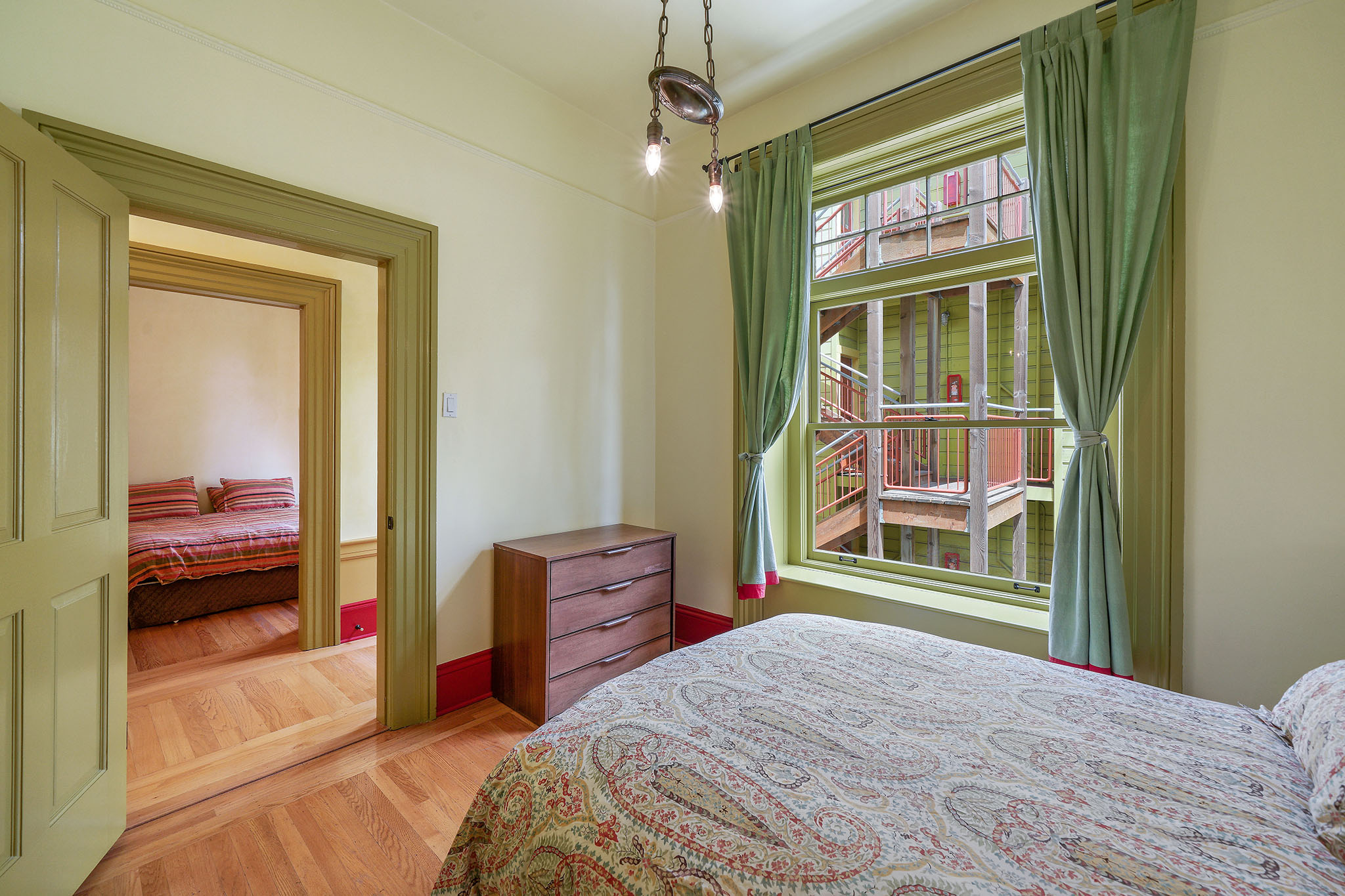 Bedroom with a view into the hall