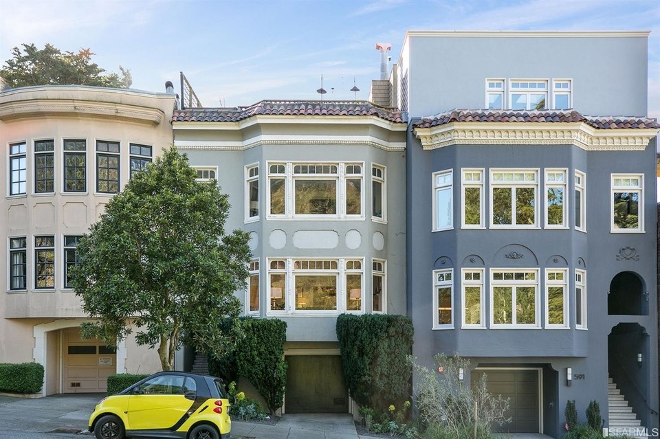 Front exterior view of 587 Buena Vista West, featuring a light blue facade