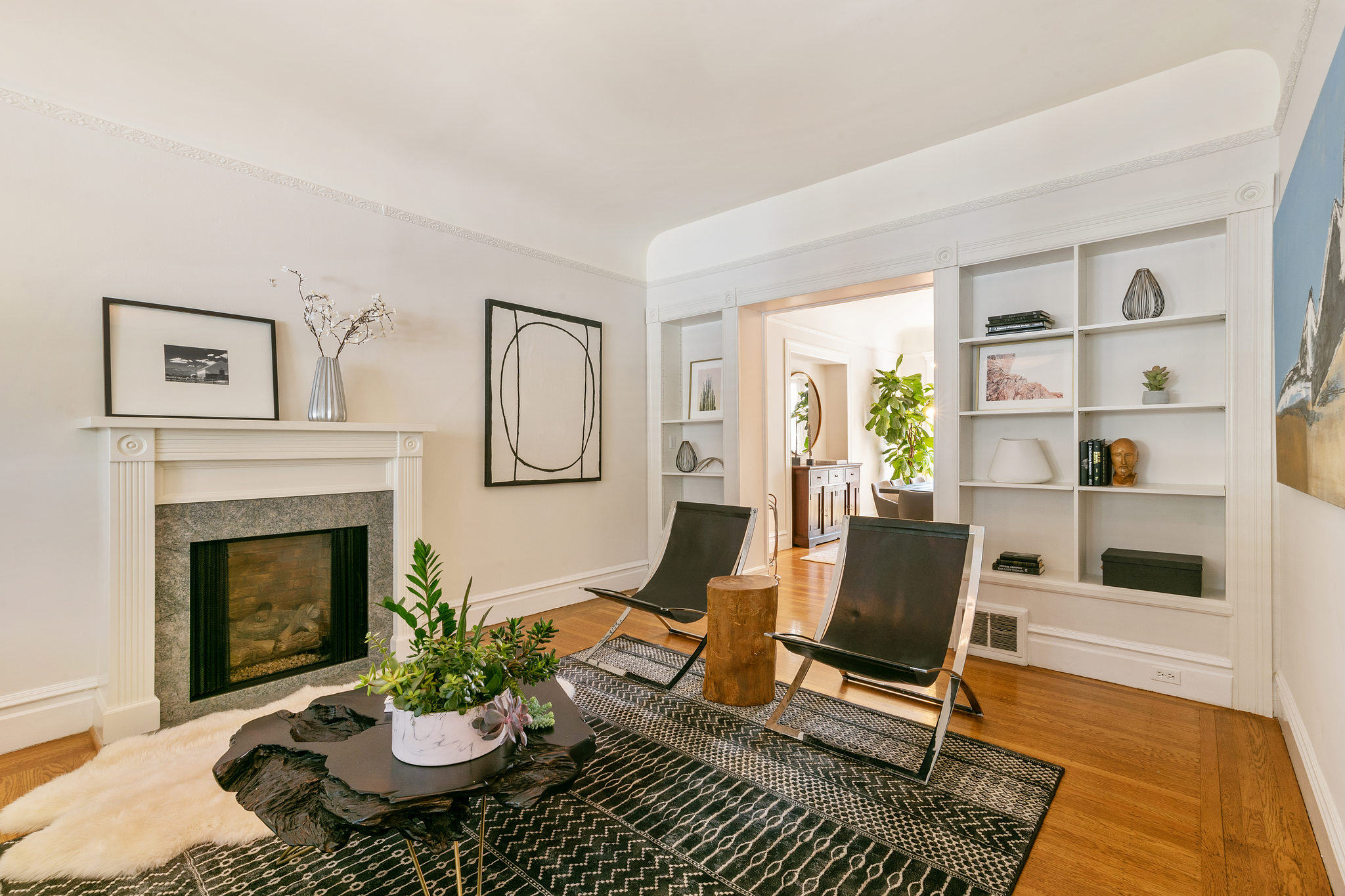 717-cole-street.37789.p3k.05.web Living room with wood floors and fireplace