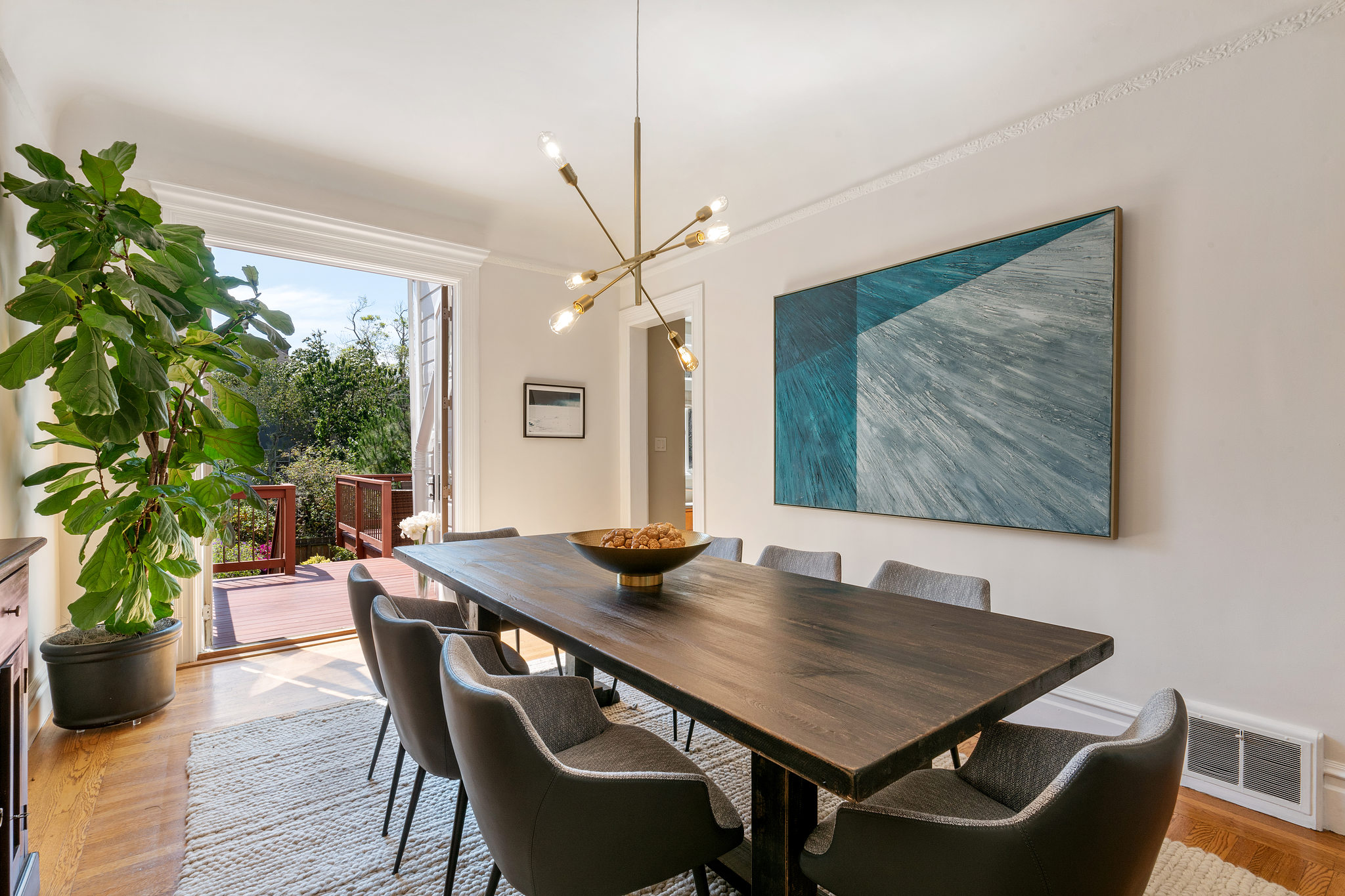 717-cole-street.37789.p3k.10.web Formal dining room with open doors to the deck