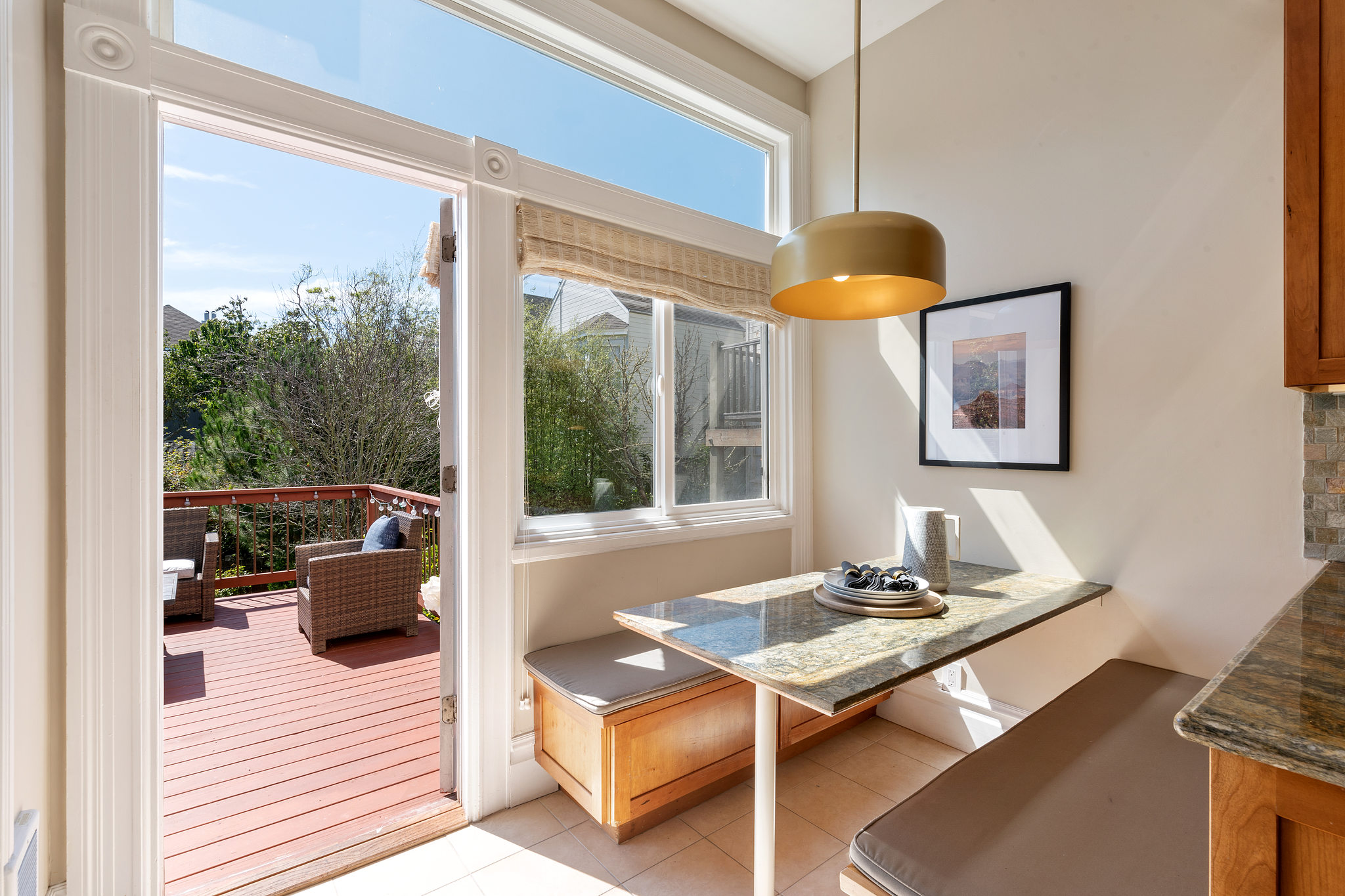 717-cole-street.37789.p3k.17.web Eat-in dining area with an open door leading to the deck