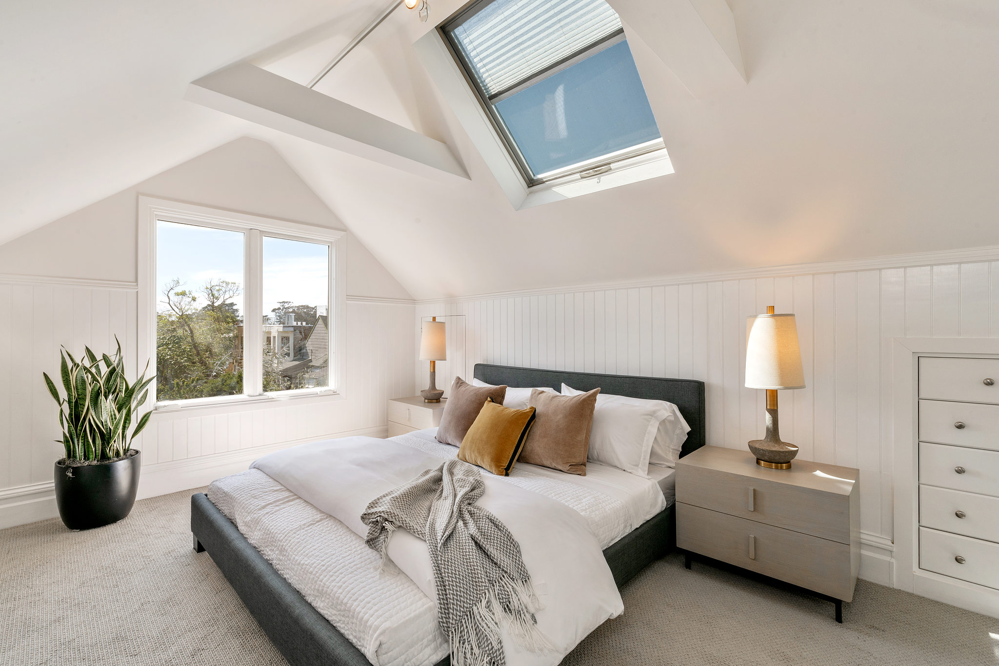 717-cole-street.37789.p3k.23.web Bedroom with skylights and white wood walls