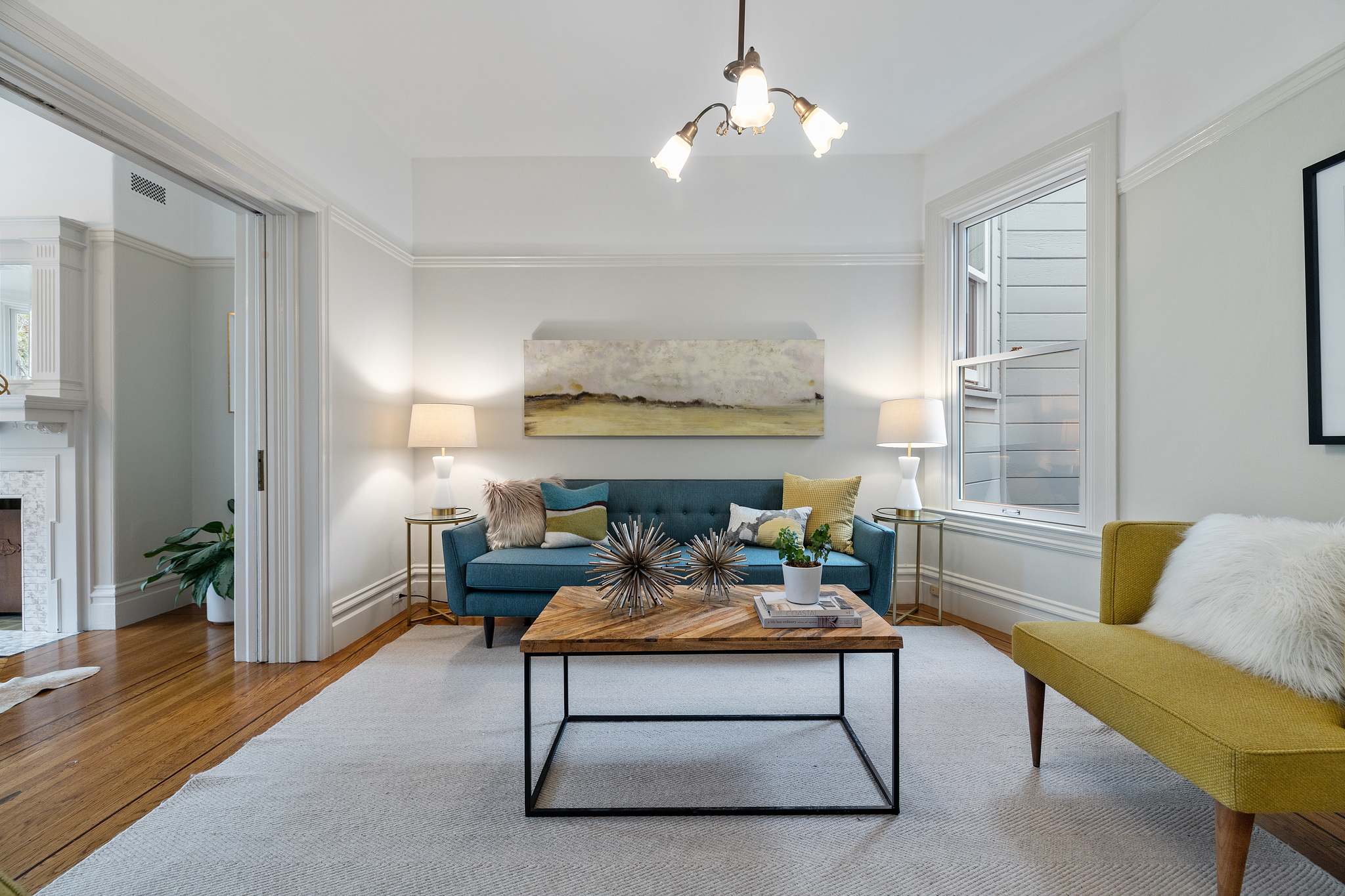 Living room featuring white walls and woodwork