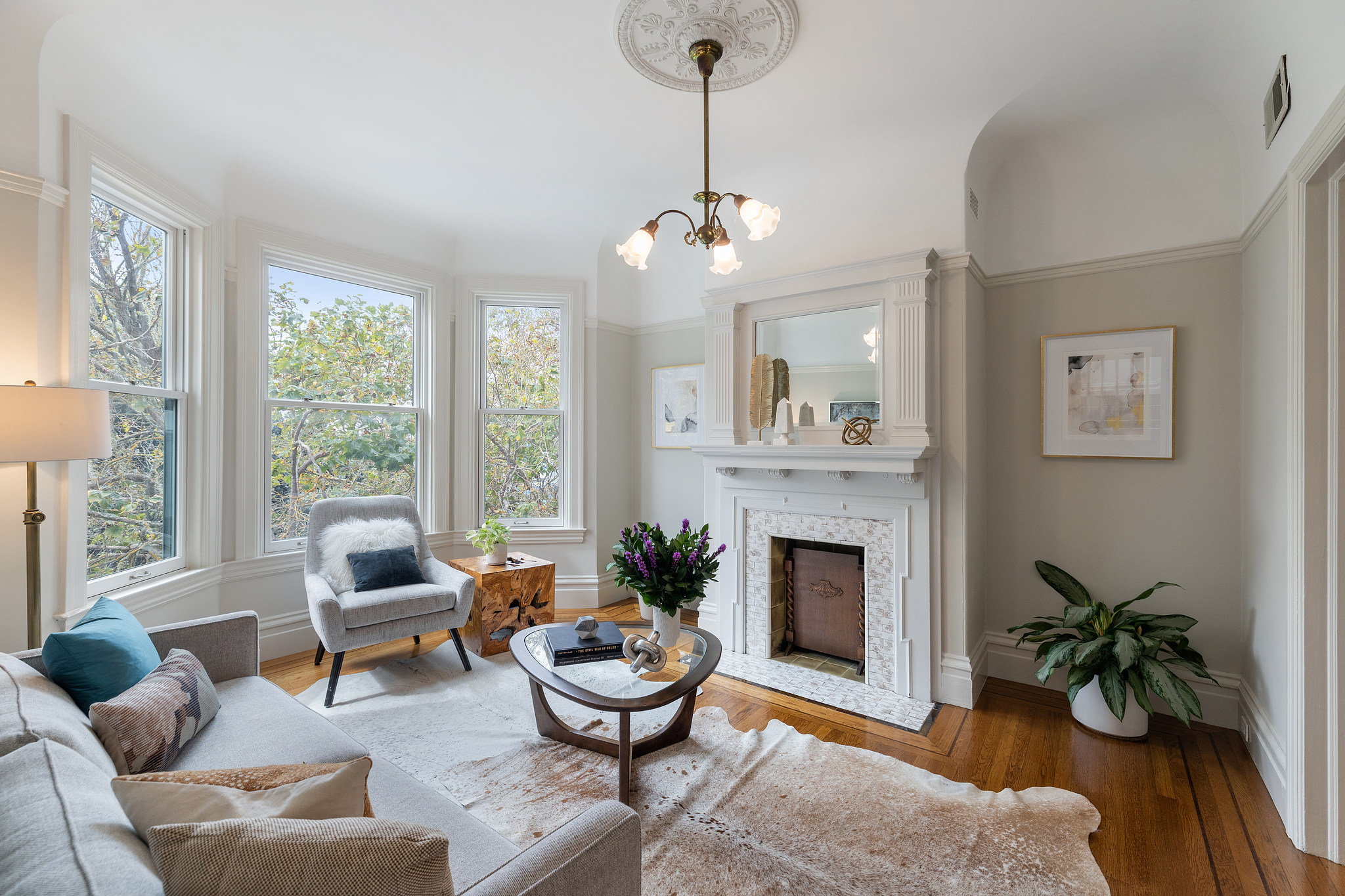 View of the living room at 726 Clayton Street, featuring a fireplace