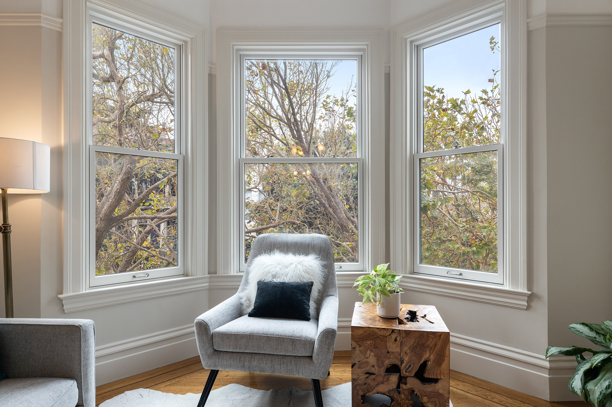 Seating area near three large windows