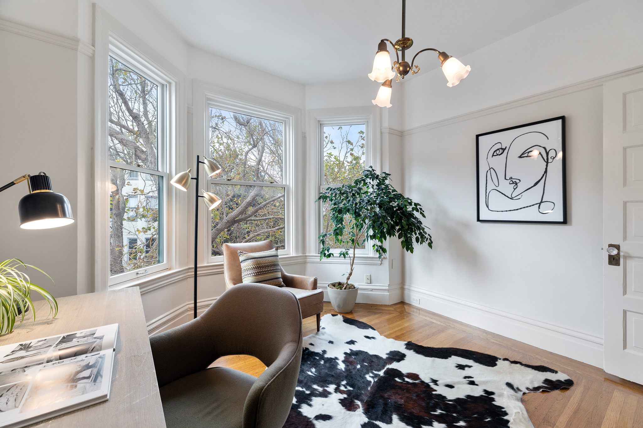 Large windows and artwork adorn the walls of 726 Clayton Street
