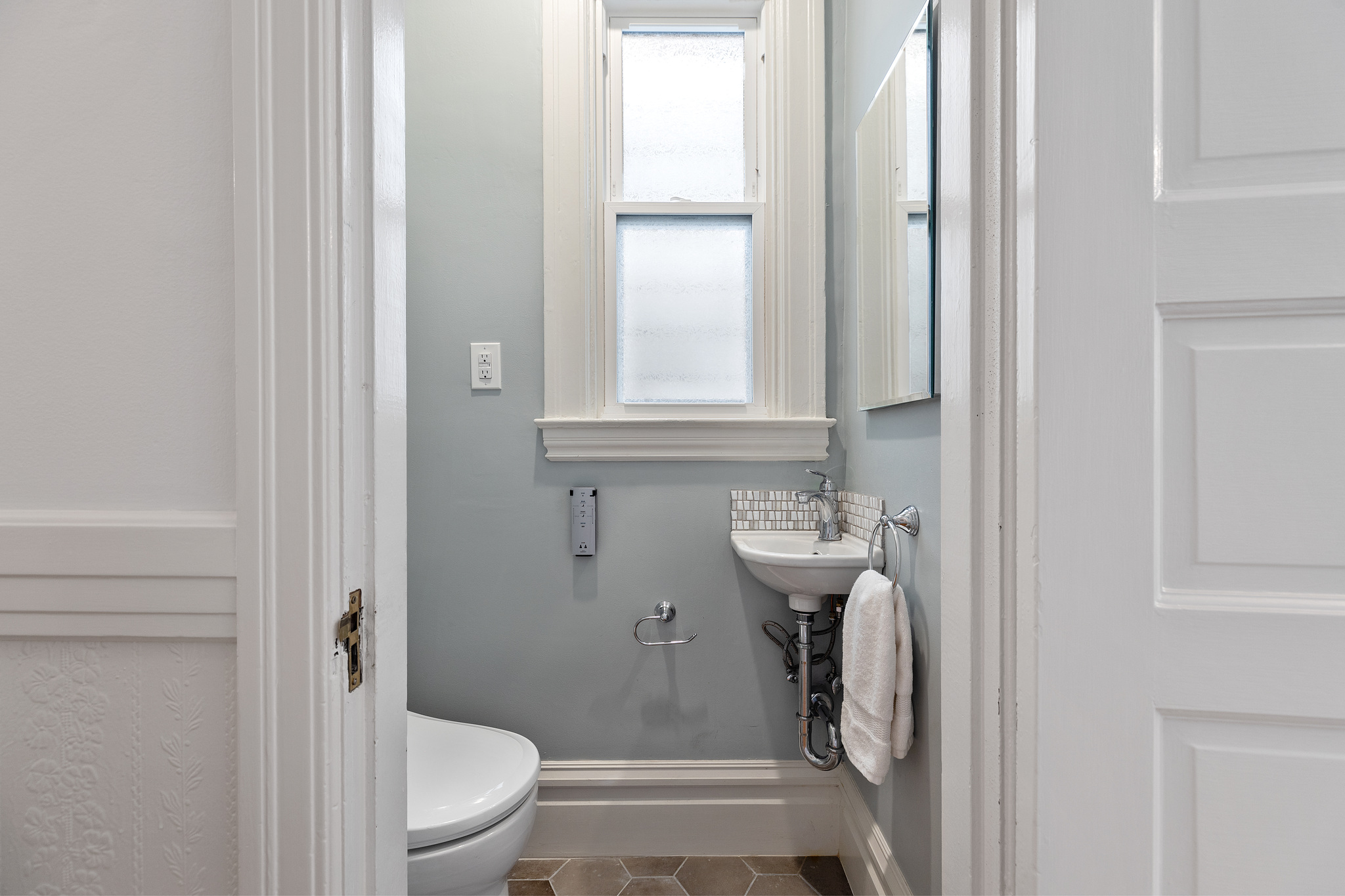 The hall-way bathroom at 726 Clayton Street