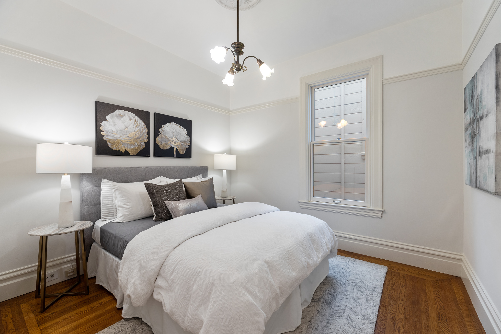 Bedroom with large window at 726 Clayton Street
