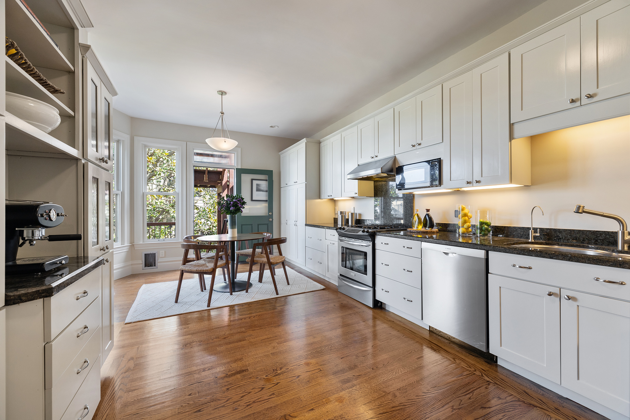 View of the galley style kitchen at 726 Clayton Street