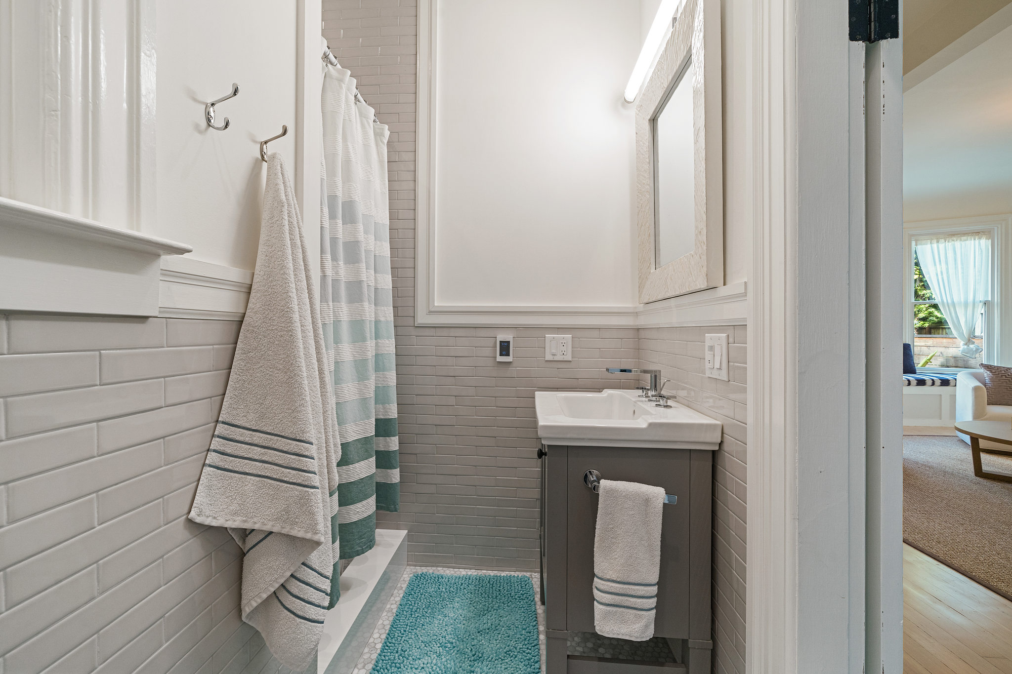 Bathroom with light grey tile