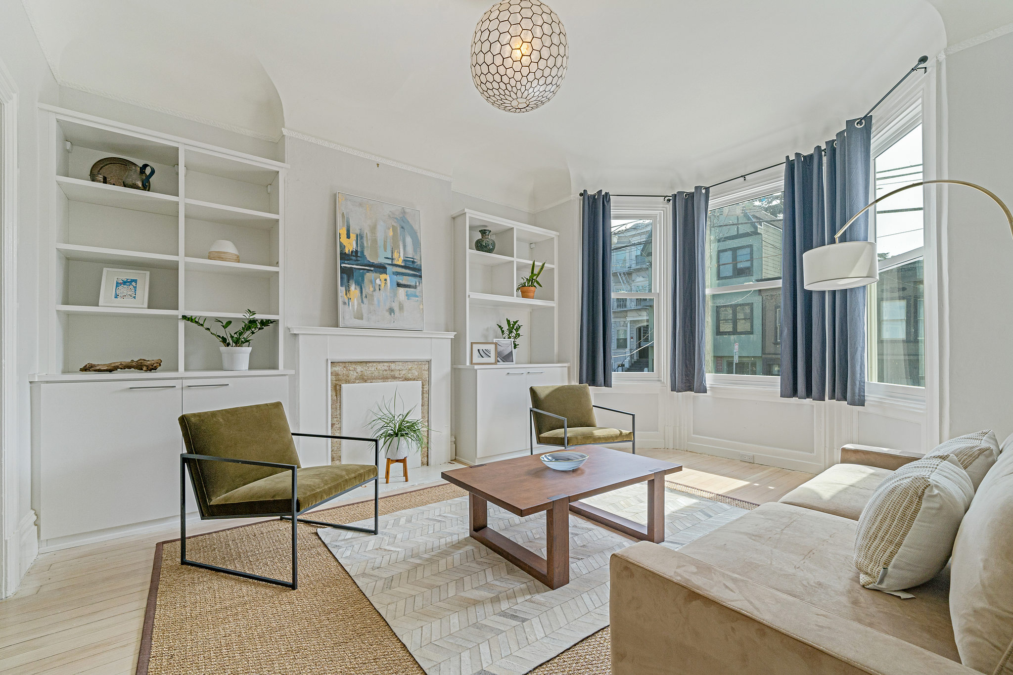 Living room with white built-in cabinets