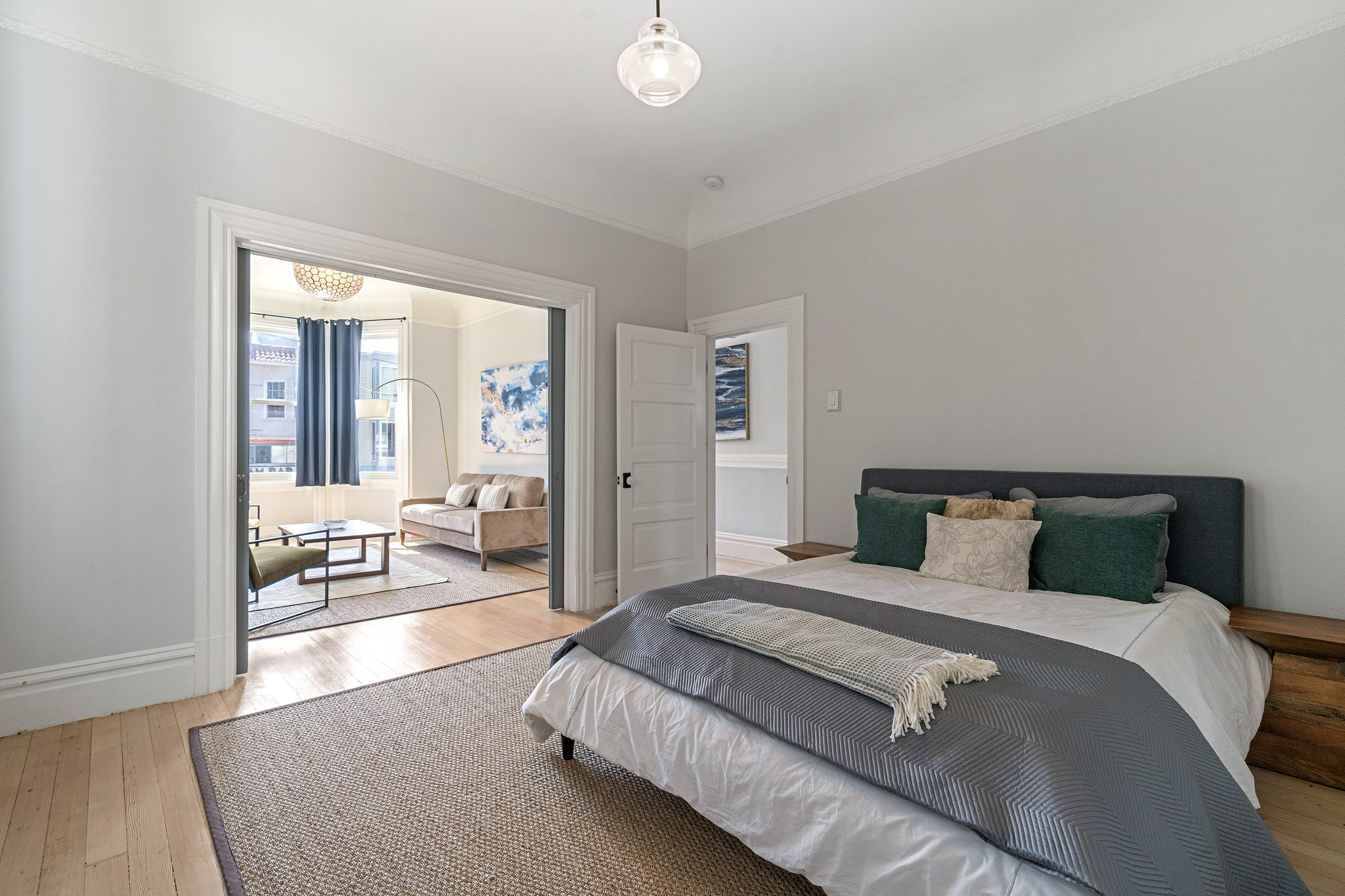 Bedroom with wood floors