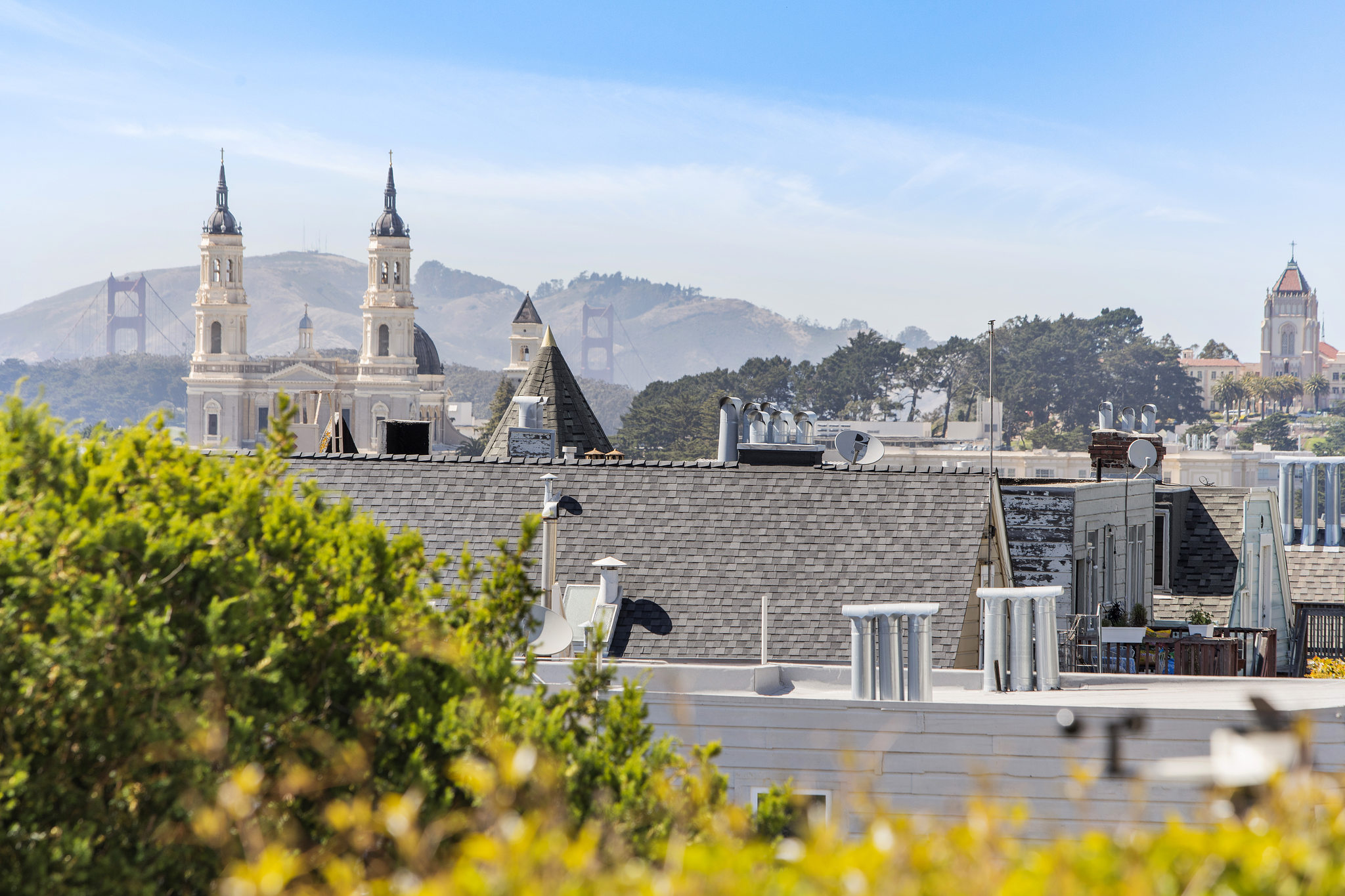 Aerial view from 929 Ashbury Street, featuring the Mission and top of the Golden Gate Bridge