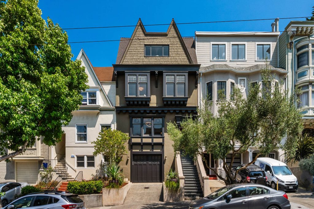 Street view of 828 Ashbury Street, showing a 4-story home