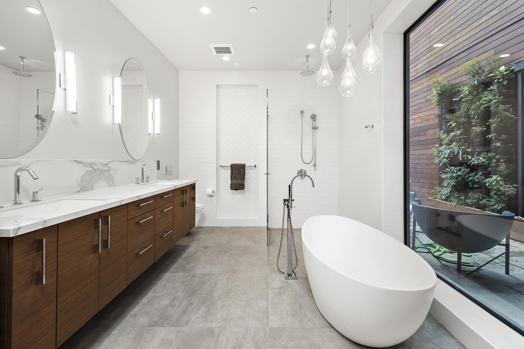 There is a large soaking tub and stand up shower with glass doors. All updated and modern features.