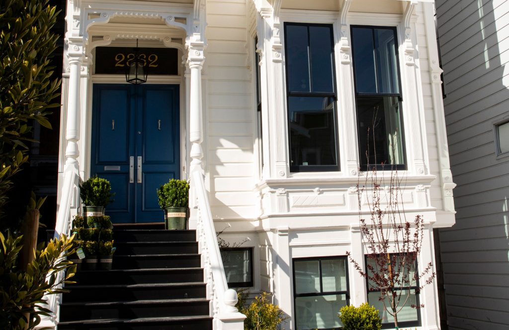Front exterior of 2862 Bush, showing a white facade