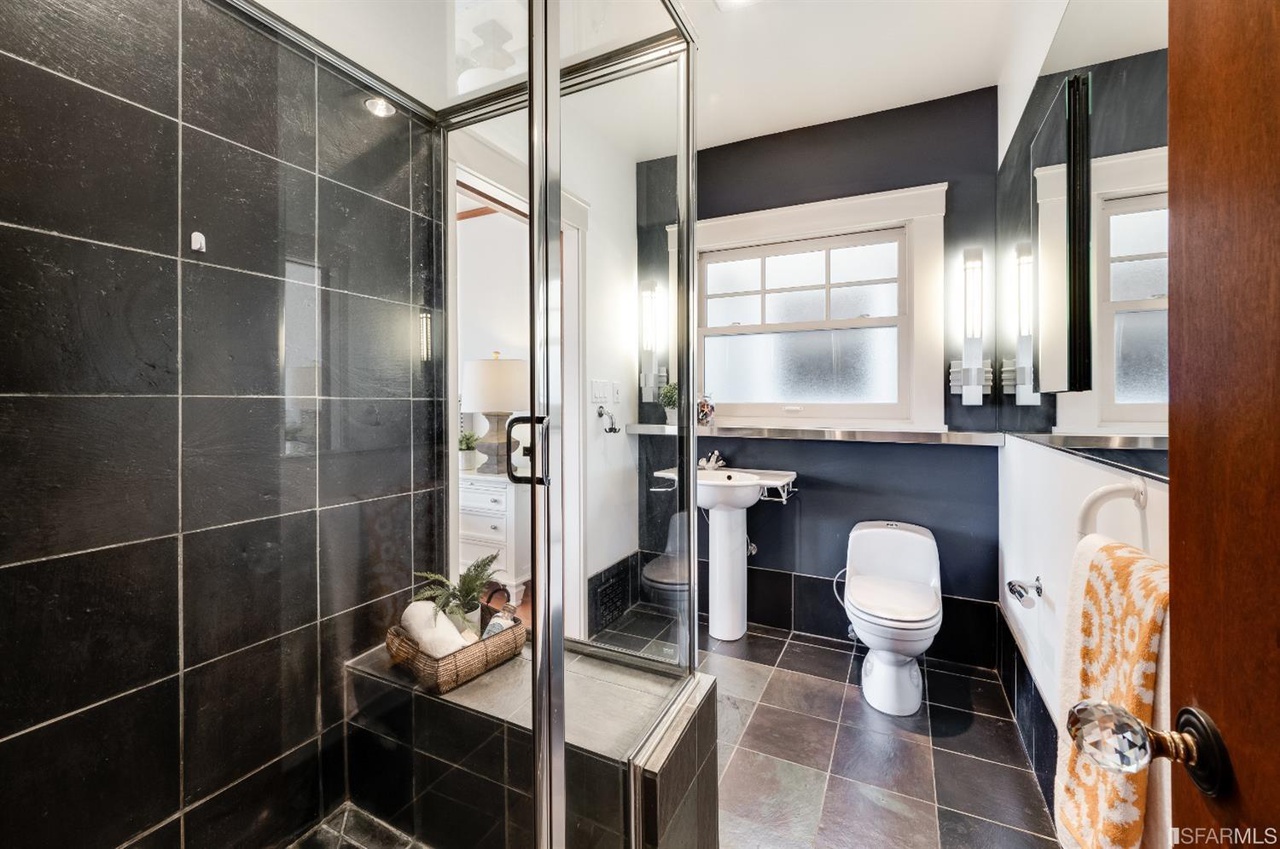 Bathroom-black-tile Bathroom with black tile and glass shower