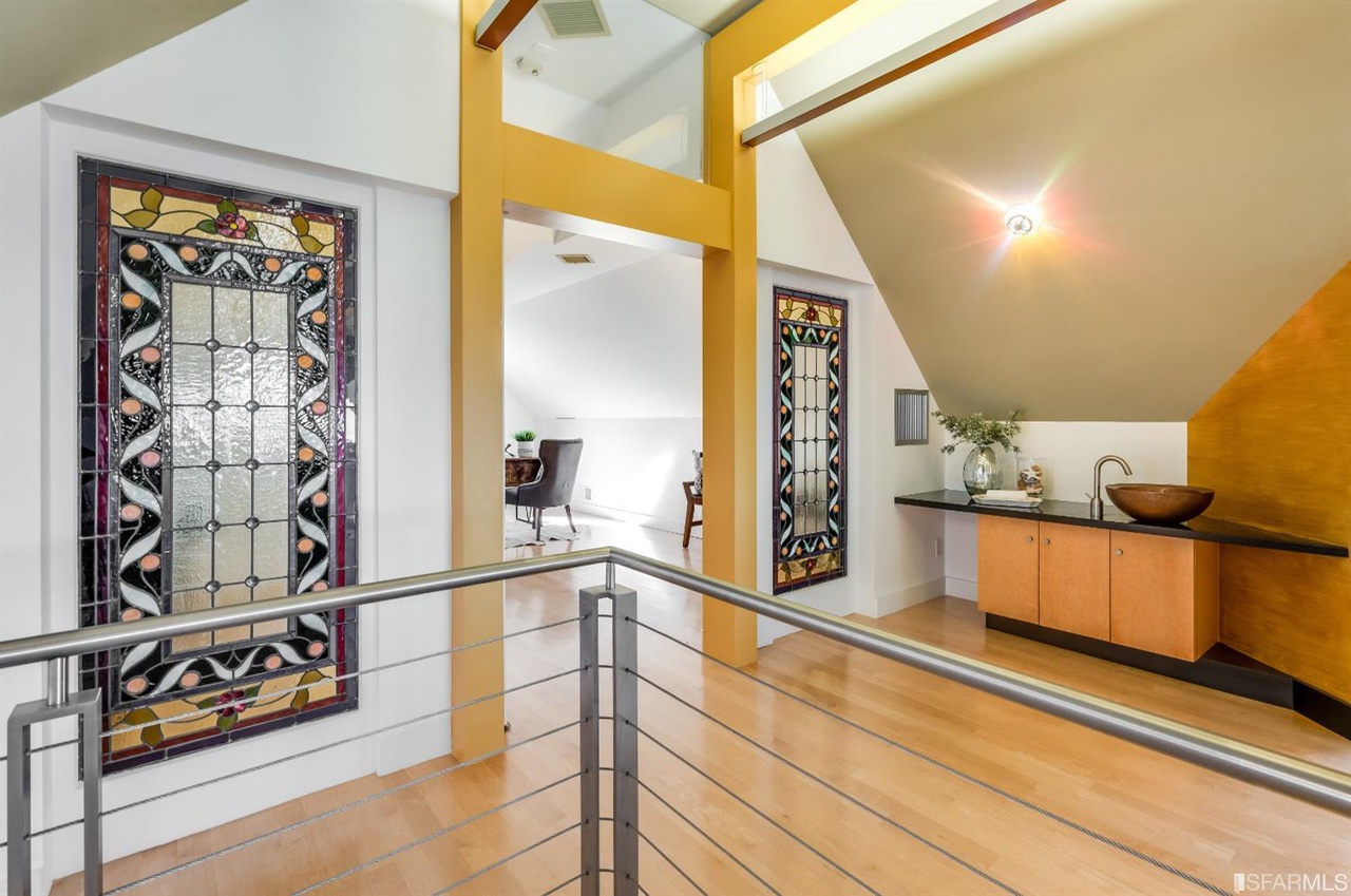 Bonus-area View from the top floor hall showing a web bar and adjoining private office