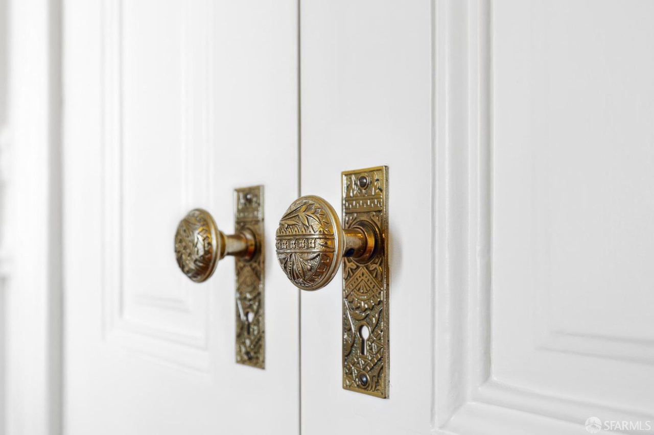 Close up shot of the vintage door knobs.