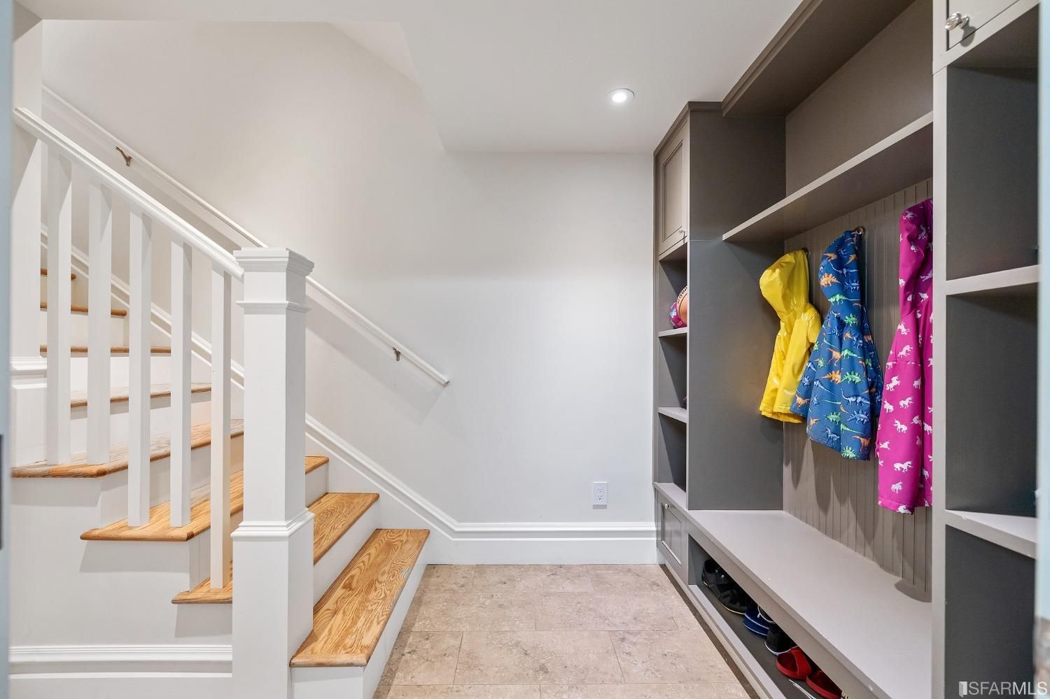 Lower level entry area with storage cubby for shoes and coats