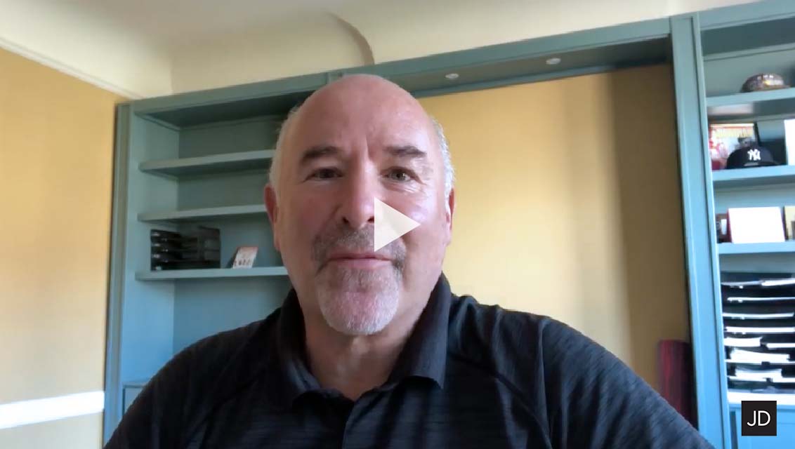 A still image of a video featuring agent John DiDomenico