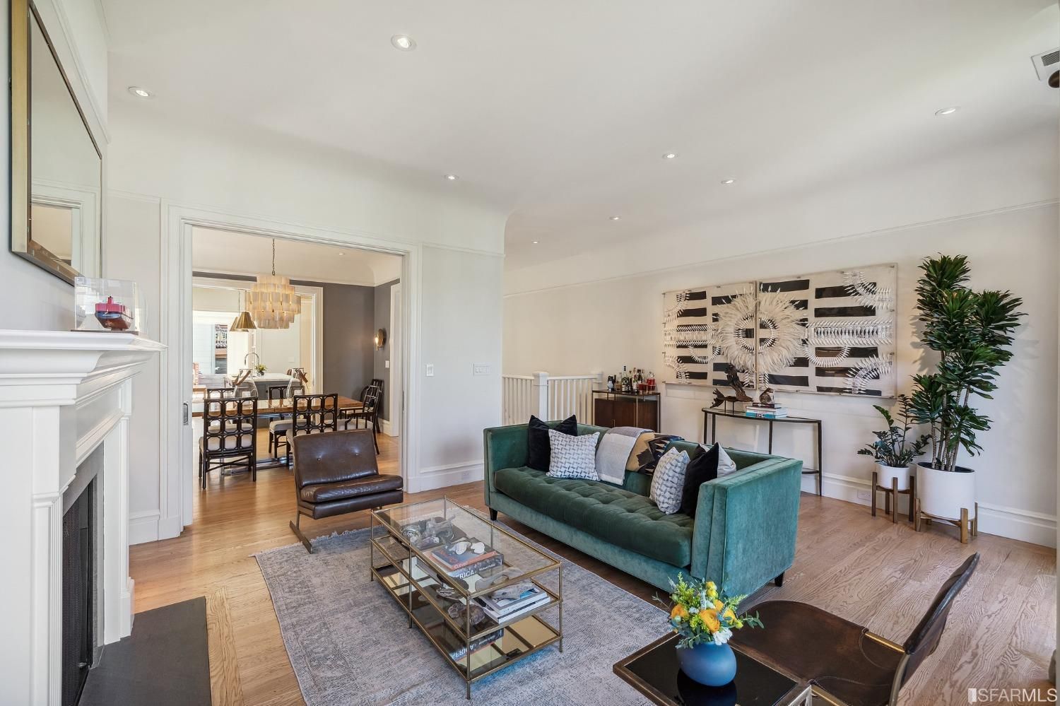 Side-view of the living room, featuring wood floors