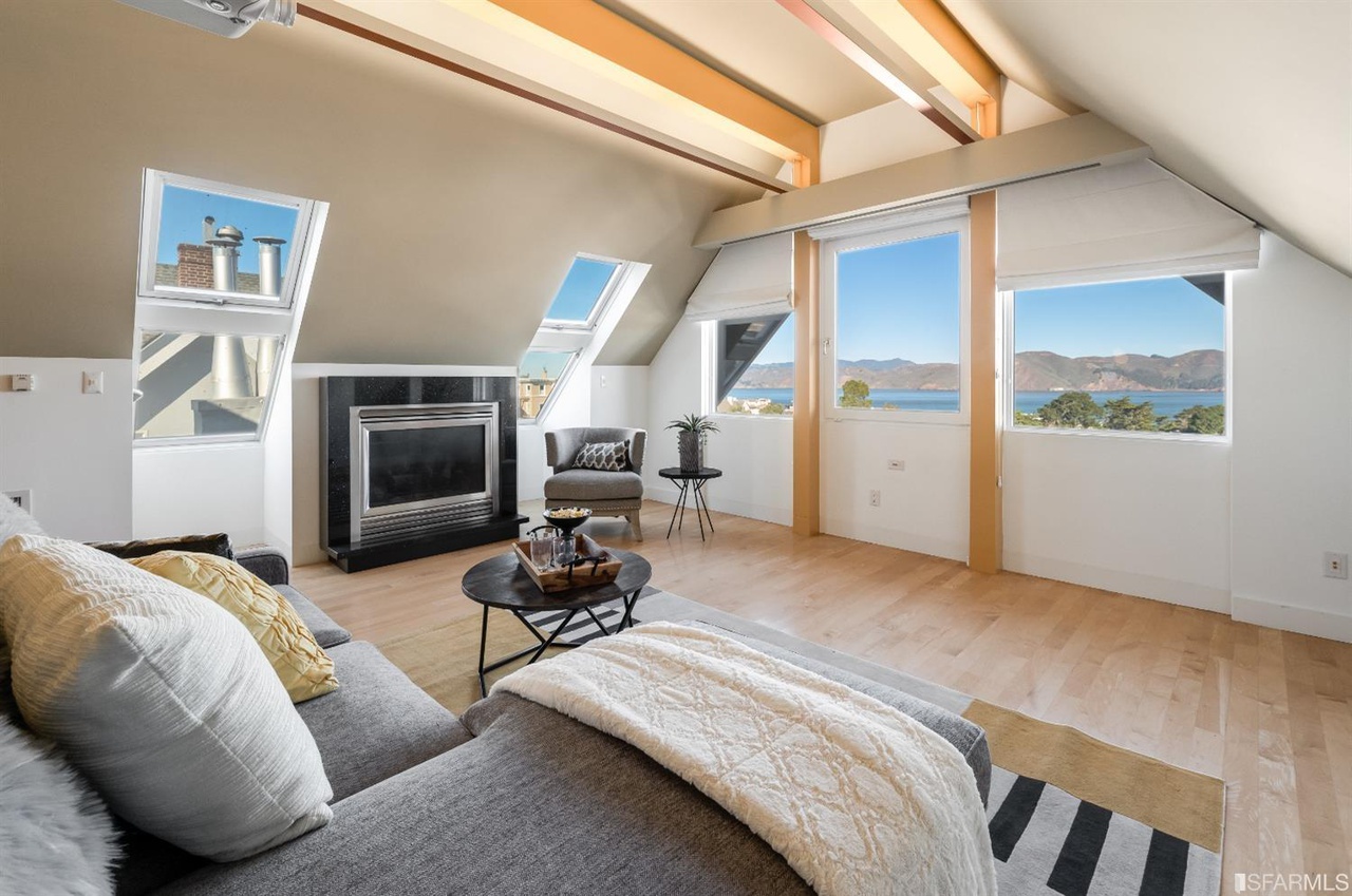 Loft-bedroom Side view of the theatre room, showing breathtaking views of San Francisco Bay