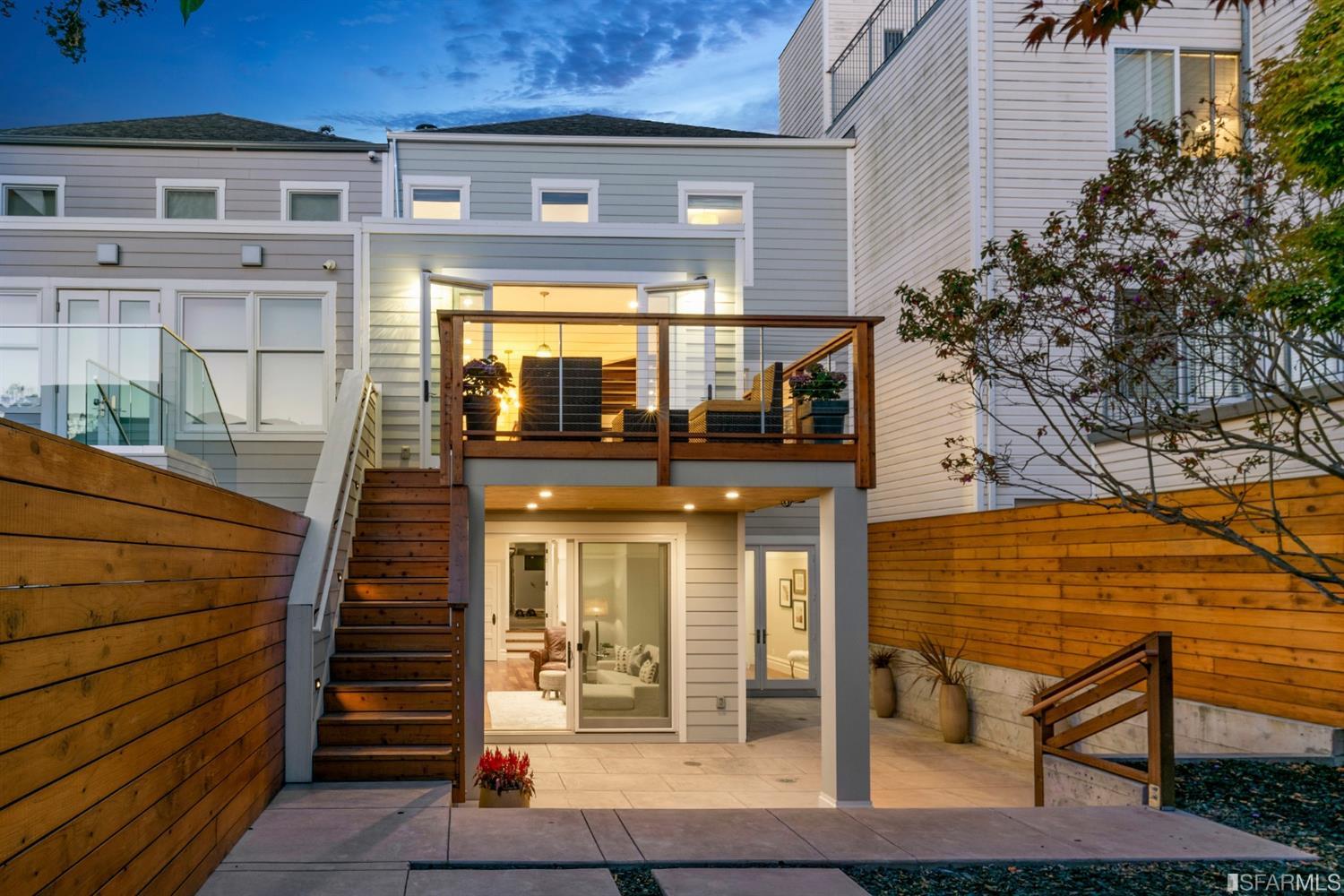Rear-ext Twilight rear view of 1235 5th Ave, showing two levels of outdoor living