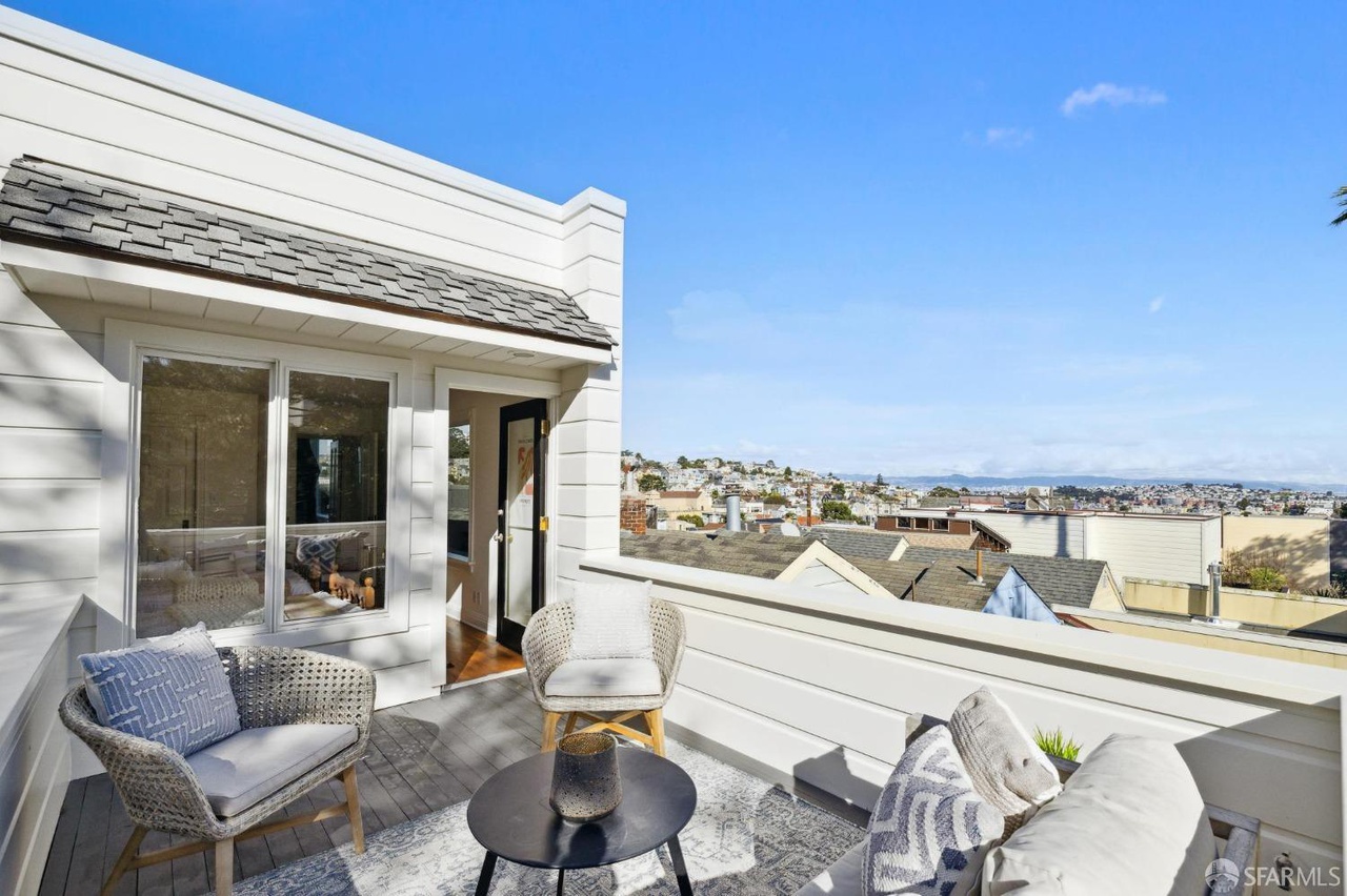 Views all the way to the bay from upper patio off the guest bedroom.