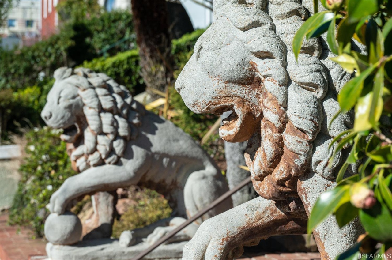 Stone-Lions Close-up view of two stone lions found outside 2212 Lake Street