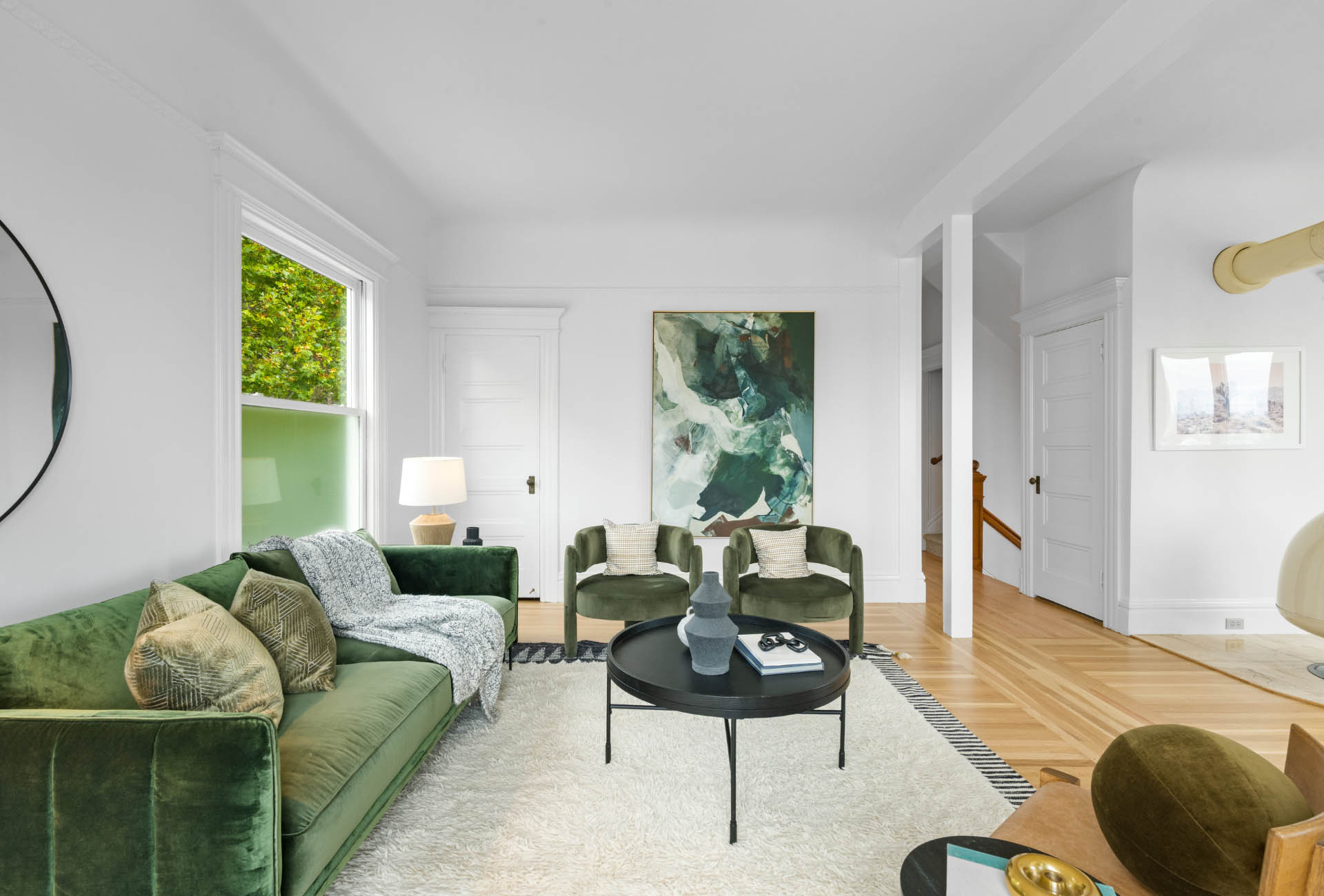 living-area-of171-173-Buena-vista-ave-east Living room has hardwood floors through out.