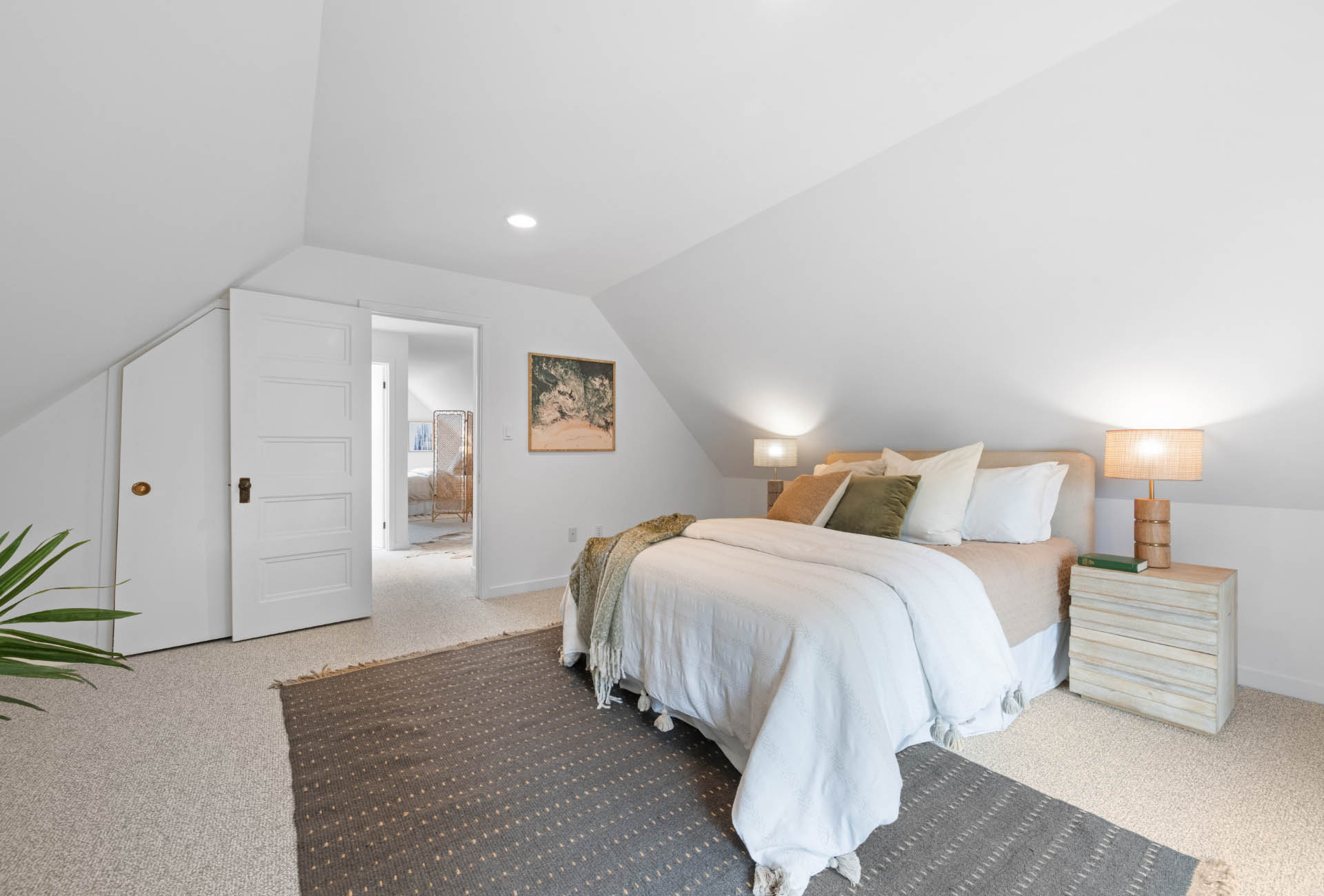 third-level-bedroom-living-area-of171-173-Buena-vista-ave-east Upper level does have a seperate bedroom space which also has the vaulted ceilings.